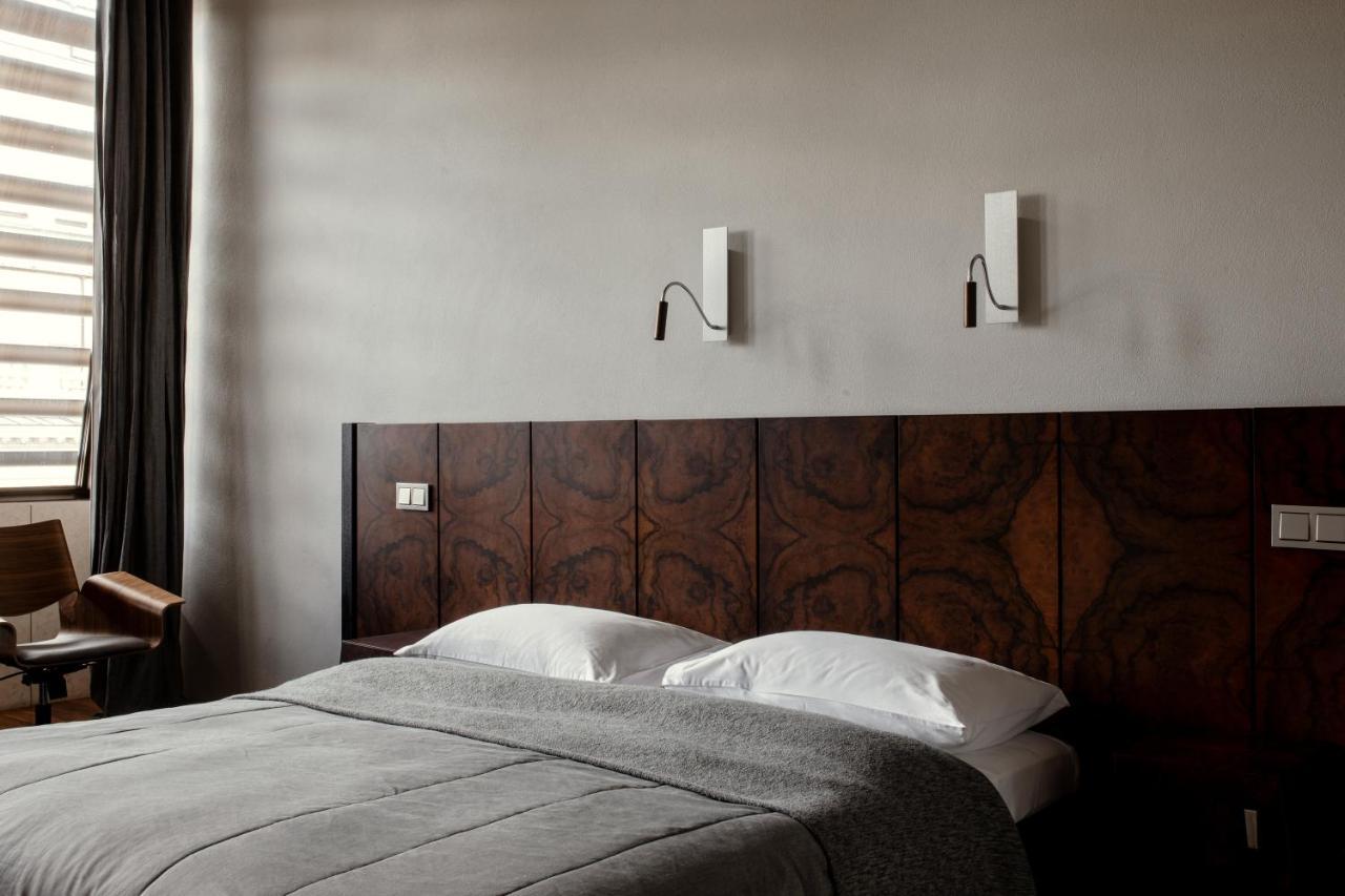 ホテル モノポール ブロツワフ ヴロツワフ エクステリア 写真 A bedroom at the Hotel